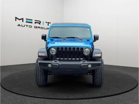 Another view of 2021 Jeep Wrangler Unlimited Willys Sport SUV 4D for sale in Jacksonville, FL at Merit Auto Group Atlantic