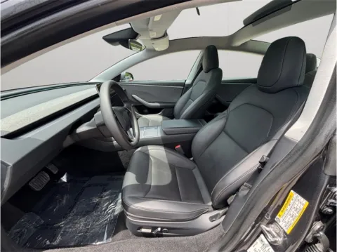 Photos of 2024 Tesla Model 3 Standard Sedan 4D for sale in Jacksonville, FL at Merit Auto Group Atlantic