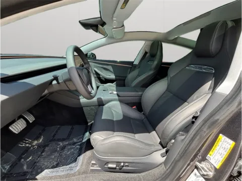 Photos of 2024 Tesla Model 3 Performance Sedan 4D for sale in Jacksonville, FL at Merit Auto Group Atlantic