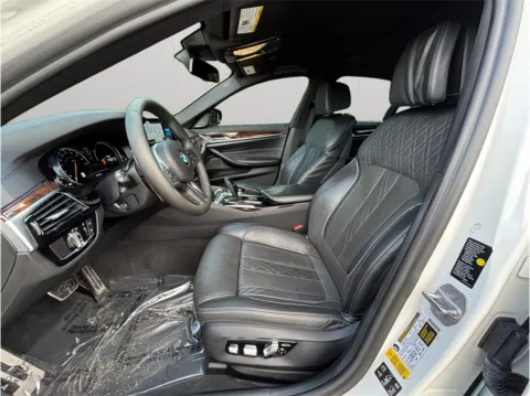 Photos of 2018 BMW 5 Series M550i xDrive Sedan 4D for sale in Jacksonville, FL at Merit Auto Group Atlantic