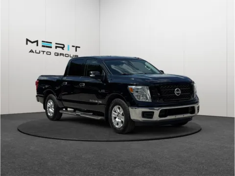 Black 2019 Nissan Titan Crew Cab SV Pickup 4D 5 1/2 ft for sale in Jacksonville, FL