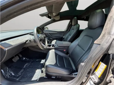 Photos of 2022 Tesla Model 3 Standard Sedan 4D for sale in Jacksonville, FL at Merit Auto Group Atlantic
