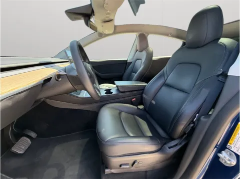 Photos of 2022 Tesla Model Y Long Range Sport Utility 4D for sale in Jacksonville, FL at Merit Auto Group Atlantic