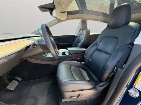 Photos of 2022 Tesla Model Y Long Range Sport Utility 4D for sale in Jacksonville, FL at Merit Auto Group Atlantic