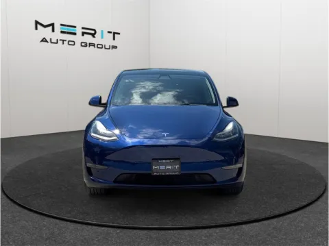 Another view of 2022 Tesla Model Y Long Range Sport Utility 4D for sale in Jacksonville, FL at Merit Auto Group Atlantic