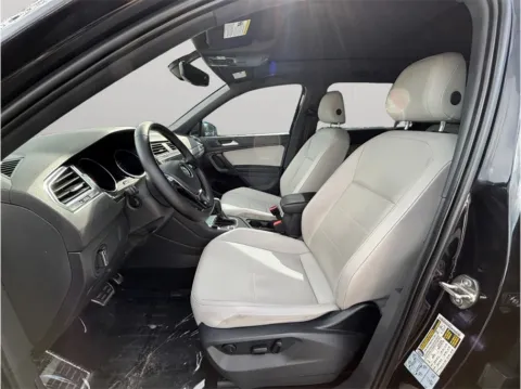 Photos of 2021 Volkswagen Tiguan SE R-Line Black Sport Utility 4D for sale in Jacksonville, FL at Merit Auto Group Atlantic