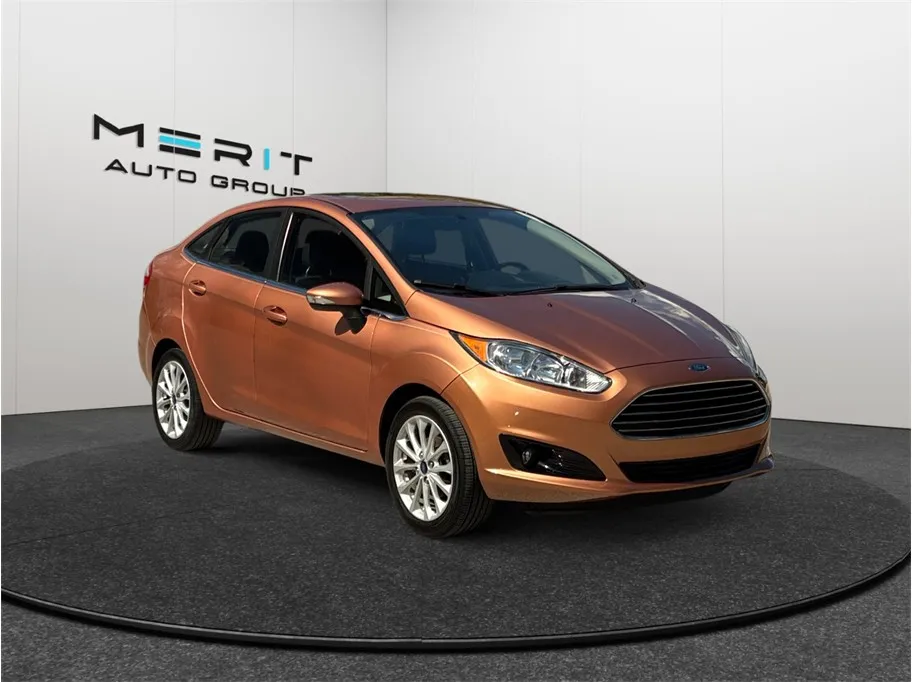 Orange 2017 Ford Fiesta Titanium Sedan 4D for sale in Jacksonville, FL