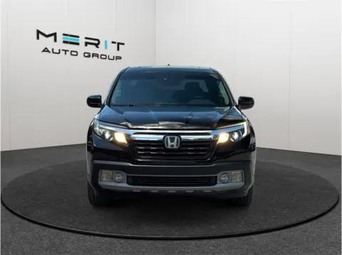 Another view of 2017 Honda Ridgeline RTL-E Pickup 4D 5 ft for sale in Jacksonville, FL at Merit Auto Group Atlantic