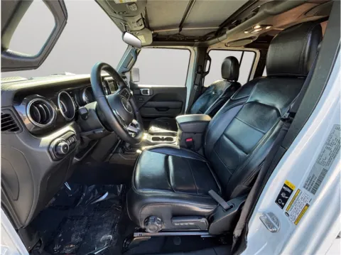 Photos of 2021 Jeep Wrangler Unlimited Sahara Altitude Sport Utility 4D for sale in Jacksonville, FL at Merit Auto Group Atlantic