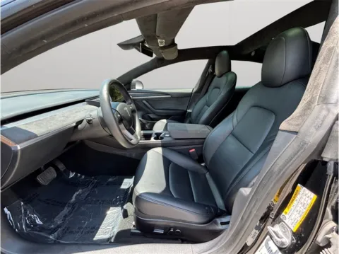 Photos of 2022 Tesla Model 3 Standard Sedan 4D for sale in Jacksonville, FL at Merit Auto Group Atlantic