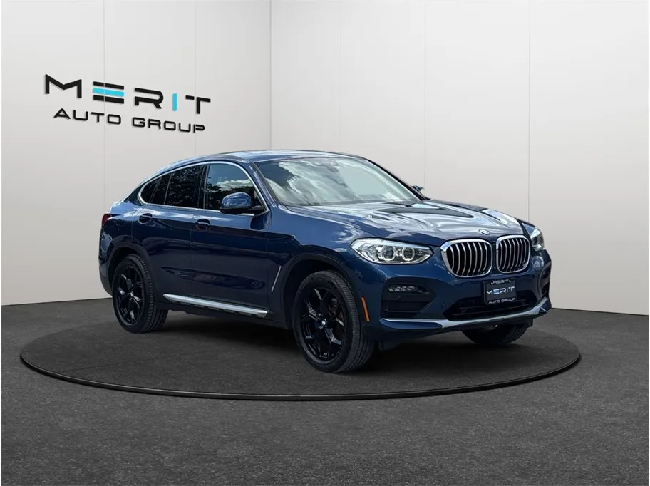 Blue 2021 BMW X4 xDrive30i Sport Utility 4D for sale in Jacksonville, FL
