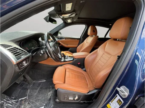 Photos of 2021 BMW X4 xDrive30i Sport Utility 4D for sale in Jacksonville, FL at Merit Auto Group Atlantic