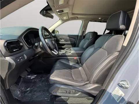 Photos of 2024 Honda Pilot Elite Sport Utility 4D for sale in Jacksonville, FL at Merit Auto Group Atlantic