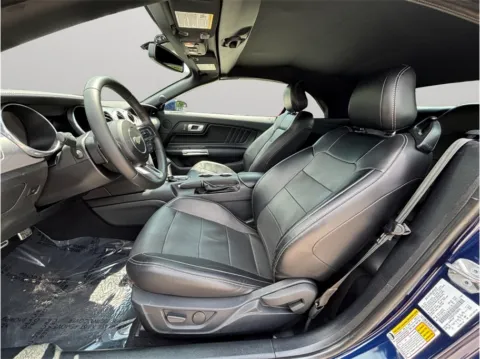 Photos of 2020 Ford Mustang EcoBoost Premium Convertible 2D for sale in Jacksonville, FL at Merit Auto Group Atlantic
