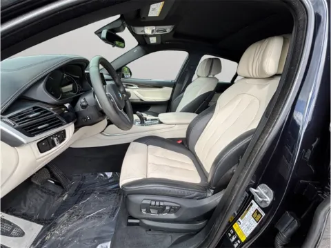 Photos of 2019 BMW X6 xDrive35i Sport Utility 4D for sale in Jacksonville, FL at Merit Auto Group Atlantic