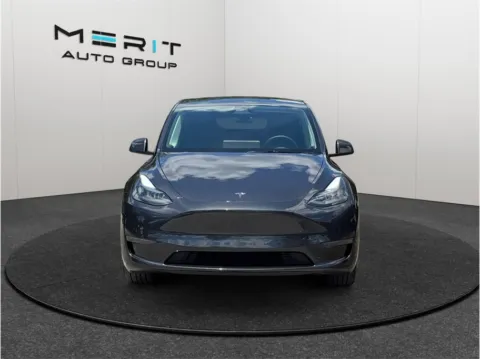 Another view of 2024 Tesla Model Y Standard Sport Utility 4D for sale in Jacksonville, FL at Merit Auto Group Atlantic