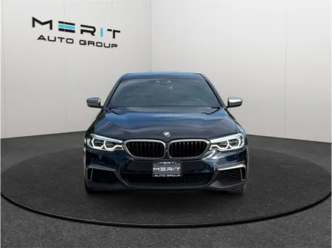 Another view of 2019 BMW 5 Series M550i xDrive Sedan 4D for sale in Jacksonville, FL at Merit Auto Group Atlantic