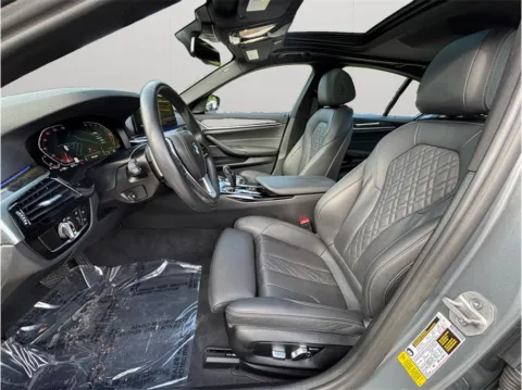 Photos of 2023 BMW 5 Series 540i Sedan 4D for sale in Jacksonville, FL at Merit Auto Group Atlantic
