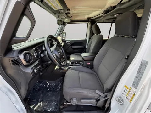 Photos of 2018 Jeep Wrangler Unlimited All New Sport S Sport Utility 4D for sale in Jacksonville, FL at Merit Auto Group Atlantic