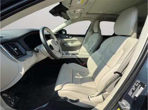 Photos of 2024 Volvo XC60 B5 Ultimate Dark Theme Sport Utility 4D for sale in Jacksonville, FL at Merit Auto Group Atlantic