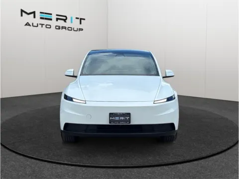 Another view of 2026 Tesla Model Y Standard Sport Utility 4D for sale in Jacksonville, FL at Merit Auto Group Atlantic