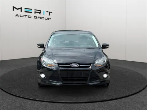 Another view of 2014 Ford Focus Titanium Hatchback 4D for sale in Jacksonville, FL at Merit Auto Group Atlantic