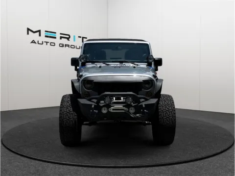 Another view of 2015 Jeep Wrangler Unlimited Rubicon Sport Utility 4D for sale in Jacksonville, FL at Merit Auto Group Atlantic