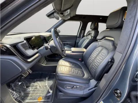Photos of 2022 Rivian R1T Adventure Pickup 4D 4 1/2 ft for sale in Jacksonville, FL at Merit Auto Group Atlantic