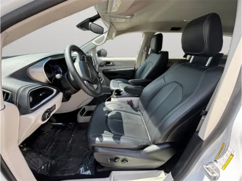 Photos of 2024 Chrysler Pacifica Hybrid Select Van 4D for sale in Jacksonville, FL at Merit Auto Group Atlantic