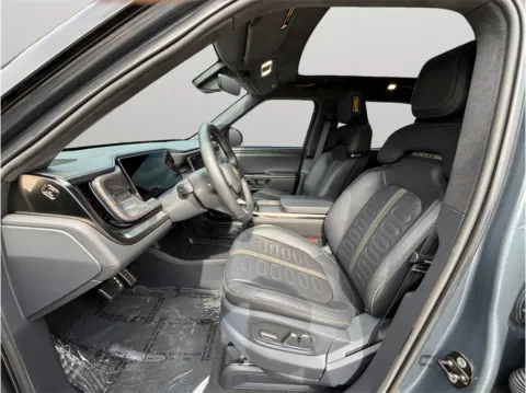 Photos of 2022 Rivian R1T Adventure Pickup 4D 4 1/2 ft for sale in Jacksonville, FL at Merit Auto Group Atlantic