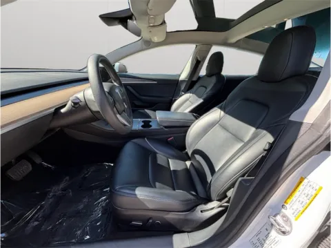 Photos of 2022 Tesla Model 3 Standard Sedan 4D for sale in Jacksonville, FL at Merit Auto Group Atlantic