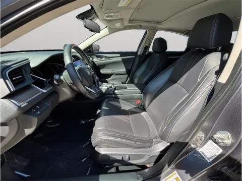 Photos of 2016 Honda Civic Touring Sedan 4D for sale in Jacksonville, FL at Merit Auto Group Atlantic