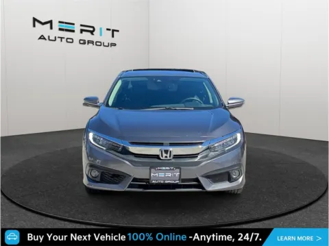 Another view of 2016 Honda Civic Touring Sedan 4D for sale in Jacksonville, FL at Merit Auto Group Atlantic