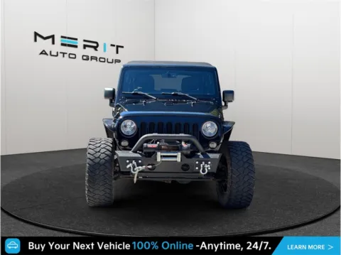Another view of 2017 Jeep Wrangler Unlimited Sport SUV 4D for sale in Jacksonville, FL at Merit Auto Group Atlantic