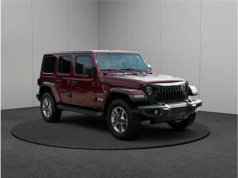Red 2022 Jeep Wrangler Unlimited Sahara Sport Utility 4D for sale in Jacksonville, FL