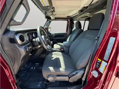 Photos of 2022 Jeep Wrangler Unlimited Sahara Sport Utility 4D for sale in Jacksonville, FL at Merit Auto Group Atlantic