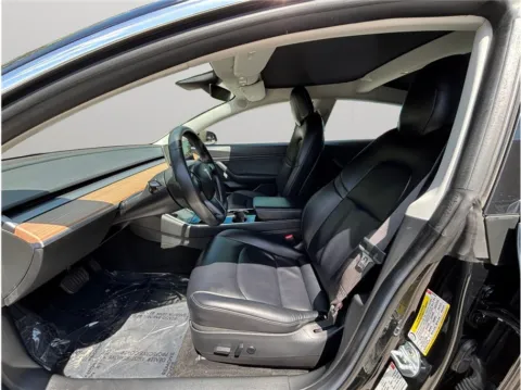 Photos of 2018 Tesla Model 3 Long Range Sedan 4D for sale in Jacksonville, FL at Merit Auto Group Atlantic