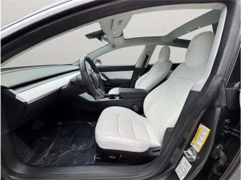Photos of 2019 Tesla Model 3 Standard Range Sedan 4D for sale in Jacksonville, FL at Merit Auto Group Atlantic