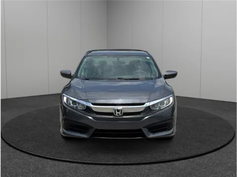 Photos of 2017 Honda Civic Sedan LX for sale in Jacksonville, FL at Merit Auto Group