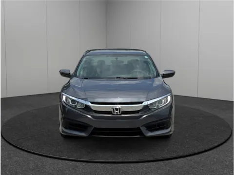 Photos of 2017 Honda Civic LX Sedan 4D for sale in Jacksonville, FL at Merit Auto Group Atlantic
