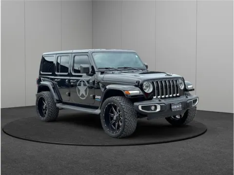 Black 2021 Jeep Wrangler 4xe Unlimited Sahara for sale in Jacksonville, FL