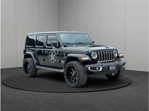 Black 2021 Jeep Wrangler Unlimited 4xe Sahara 4xe Sport Utility 4D for sale in Jacksonville, FL