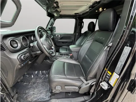 Photos of 2021 Jeep Wrangler 4xe Unlimited Sahara for sale in Jacksonville, FL at Merit Auto Group