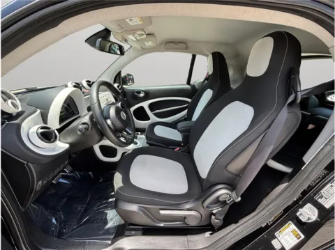 Photos of 2019 smart EQ fortwo Passion Hatchback Coupe 2D for sale in Jacksonville, FL at Merit Auto Group