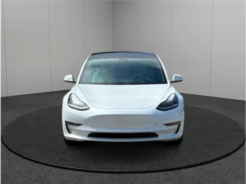Another view of 2021 Tesla Model 3 Standard Range Plus Sedan 4D for sale in Jacksonville, FL at Merit Auto Group Atlantic