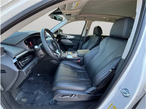 Photos of 2024 Acura MDX w/Technology Package for sale in Jacksonville, FL at Merit Auto Group