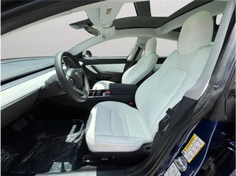 Photos of 2020 Tesla Model 3 Standard Range Plus Sedan 4D for sale in Jacksonville, FL at Merit Auto Group