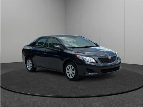 Black 2010 Toyota Corolla LE Sedan 4D for sale in Jacksonville, FL