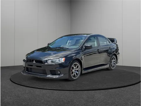 More photos of 2011 Mitsubishi Lancer Evolution GSR Sedan 4D at Merit Auto Group Atlantic, FL