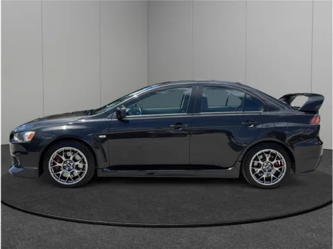 More photos of 2011 Mitsubishi Lancer Evolution GSR Sedan 4D at Merit Auto Group Atlantic, FL